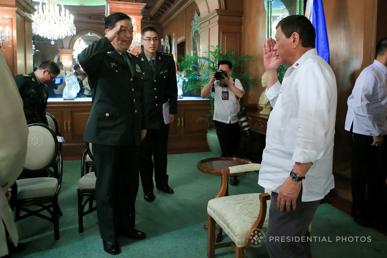 President Rodrigo Roa Duterte responds to a salute from People's Republic of China Minister of National Defense General Chang Wanquan who paid a courtesy call on the President in Malacañan Palace on October 25, 2017. ALBERT ALCAIN/PRESIDENTIAL PHOTO