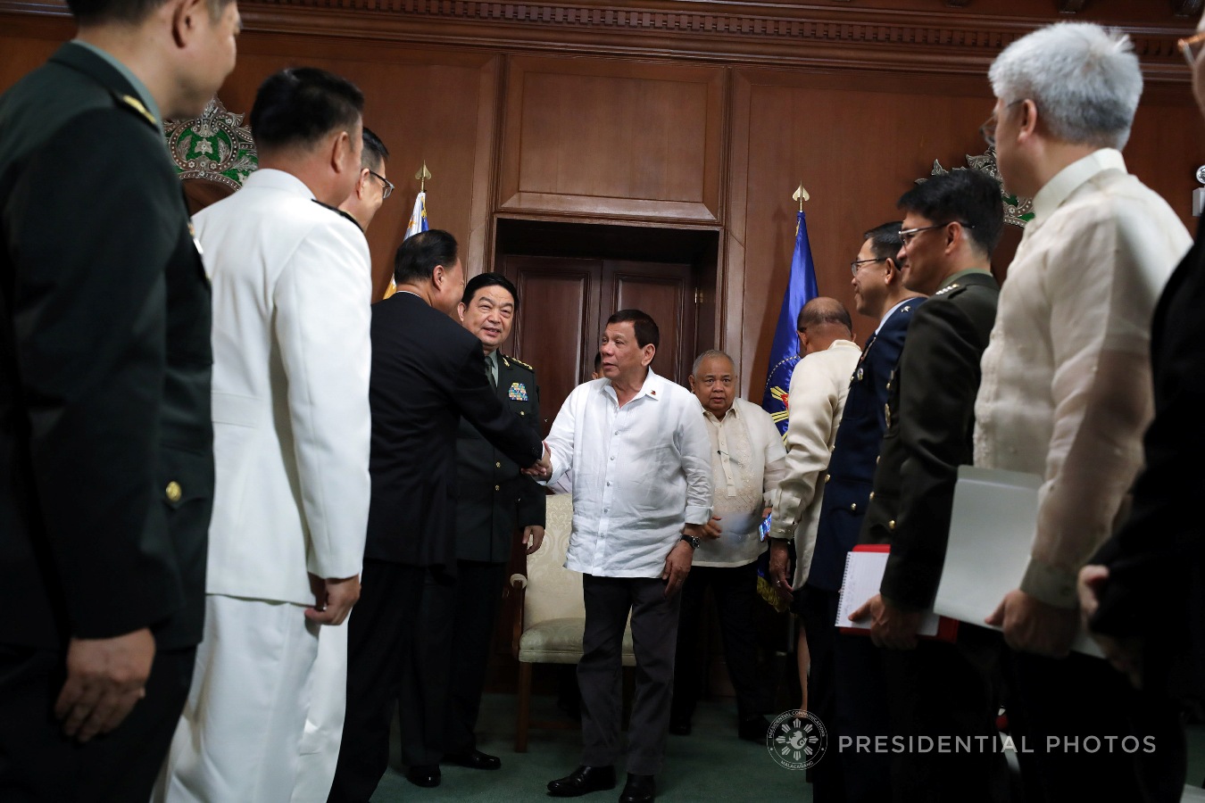 President Rodrigo Roa Duterte greets Chinese Ambassador to the Philippines Zhao Jianhua who accompanied People's Republic of China Minister of National Defense General Chang Wanquan during a courtesy call on the President in Malacañan Palace on October 25, 2017. RICHARD MADELO/PRESIDENTIAL PHOTO