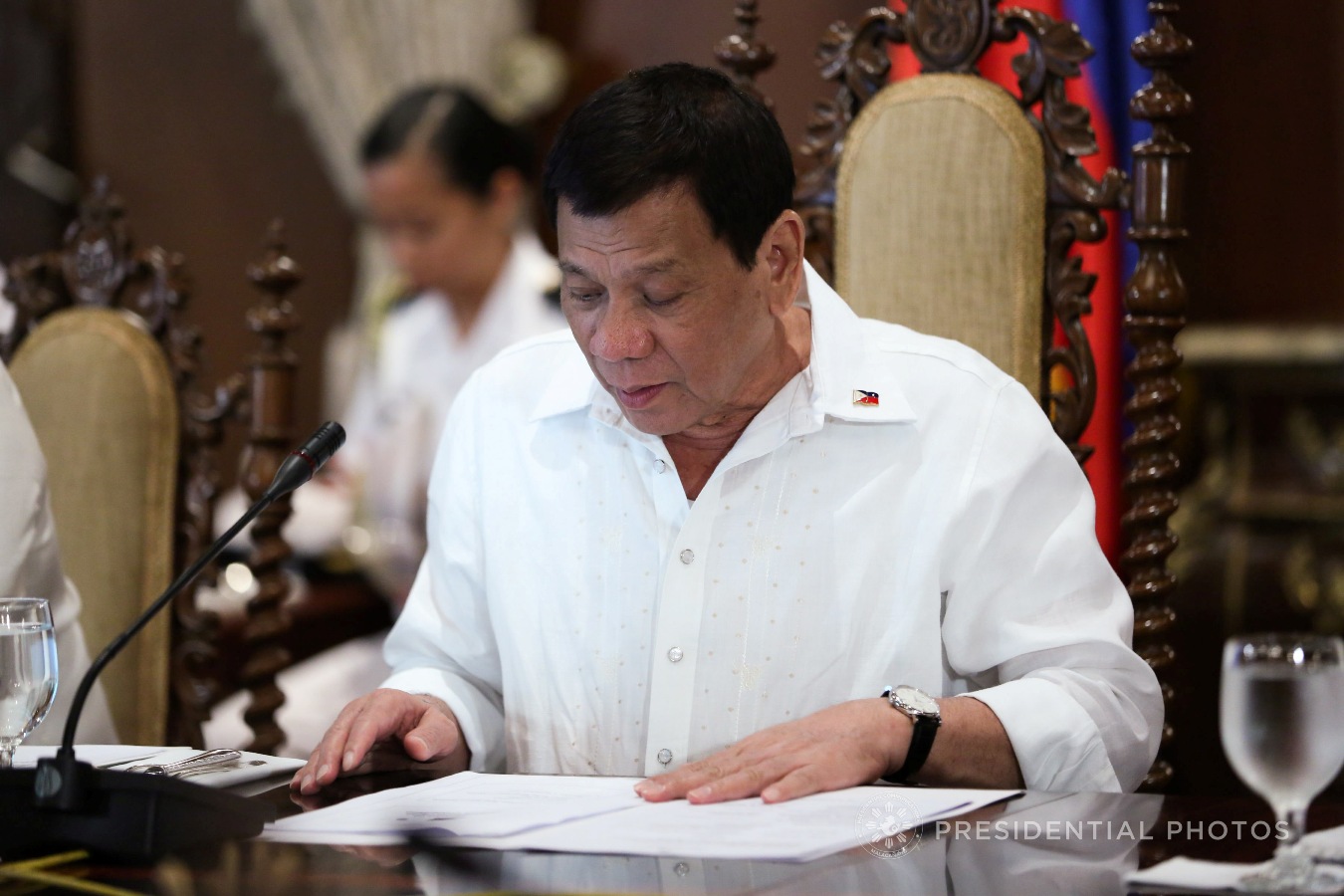 President Rodrigo Roa Duterte examines a few documents while presiding over the cabinet cluster meeting in Malacañan Palace on November 6, 2017. KARL NORMAN ALONZO/PRESIDENTIAL PHOTO