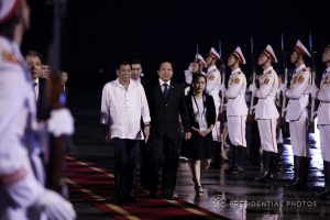 President Rodrigo Roa Duterte is accompanied by Vietnam Minister of Information and Communications Truong Minh Tuan as the President is accorded with welcome honors upon his arrival at the Da Nang International Airport in Vietnam on November 8, 2017 for his participation in the 25th Asia-Pacific Economic Cooperation (APEC) Economic Leaders’ Meeting (AELM). ROBINSON NIÑAL JR./PRESIDENTIAL PHOTO