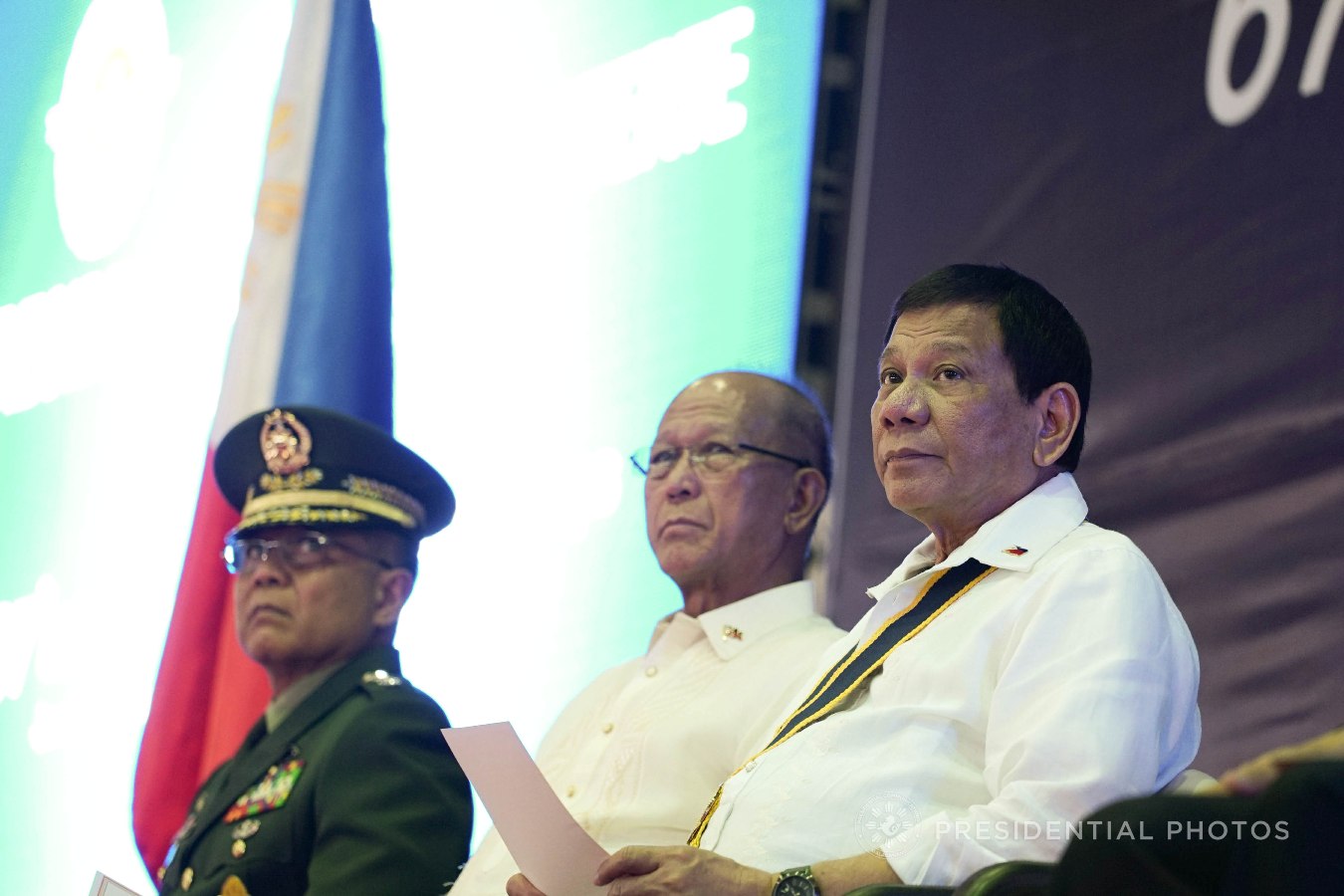 President Rodrigo Roa Duterte witnesses the program proper during the 67th Birthday celebration of the Philippine Marine Corps at the Bonifacio Naval Station in Fort Bonifacio, Taguig City on November 7, 2017. Also in the photo are Armed Forces of the Philippines Chief of Staff Rey Guerrero and Defense Secretary Delfin Lorenzana. KING RODRIGUEZ/PRESIDENTIAL PHOTO