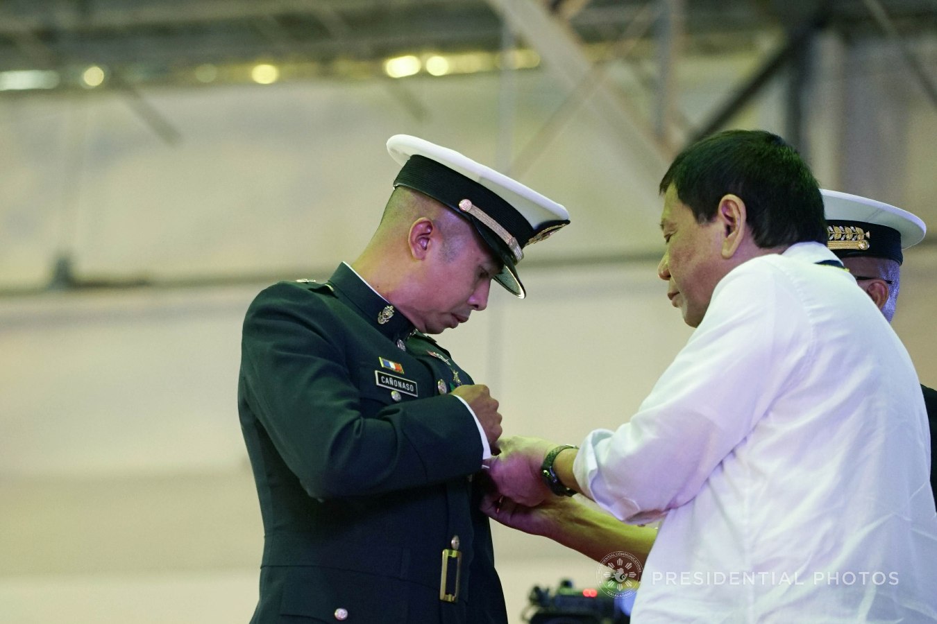 President Rodrigo Roa Duterte confers the Order of Lapu-Lapu Kamagi Medal and the Silver Cross Medal on 1Lt. John Cañonaso during the 67th Birthday celebration of the Philippine Marine Corps at the Bonifacio Naval Station in Fort Bonifacio, Taguig City on November 7, 2017. Cañonaso was hailed for his contributions to the joint operations in Palawan. KING RODRIGUEZ/PRESIDENTIAL PHOTO