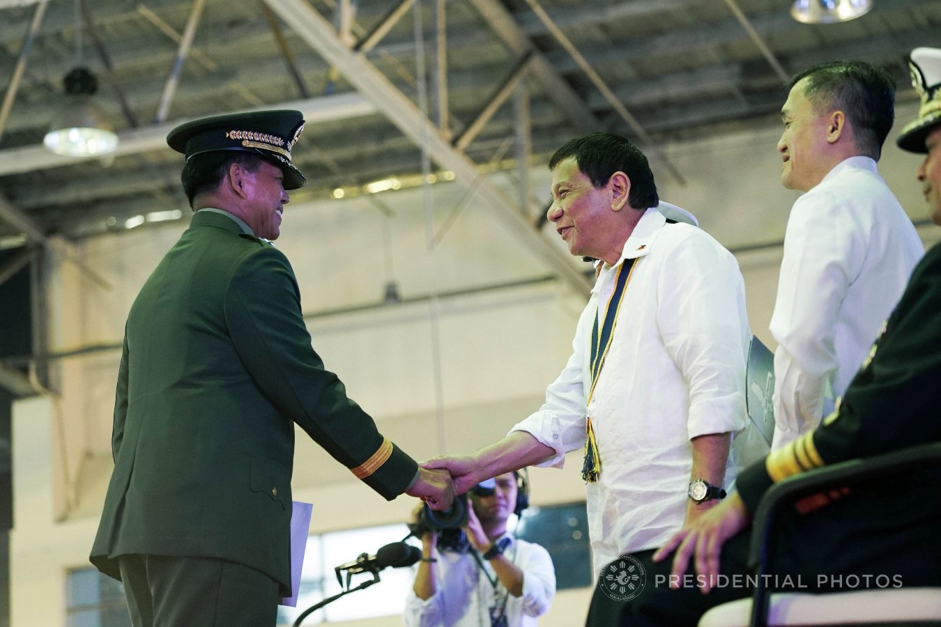 President Rodrigo Roa Duterte congratulates Philippine Army Commander Lt. Gen. Rolando Bautista who was awarded with the Command Badge during the 67th Birthday celebration of the Philippine Marine Corps at the Bonifacio Naval Station in Fort Bonifacio, Taguig City on November 7, 2017. Bautista was cited for his contributions to the victory over the Maute Group during his stint as commander of the Joint Task Force Trident. KING RODRIGUEZ/PRESIDENTIAL PHOTO