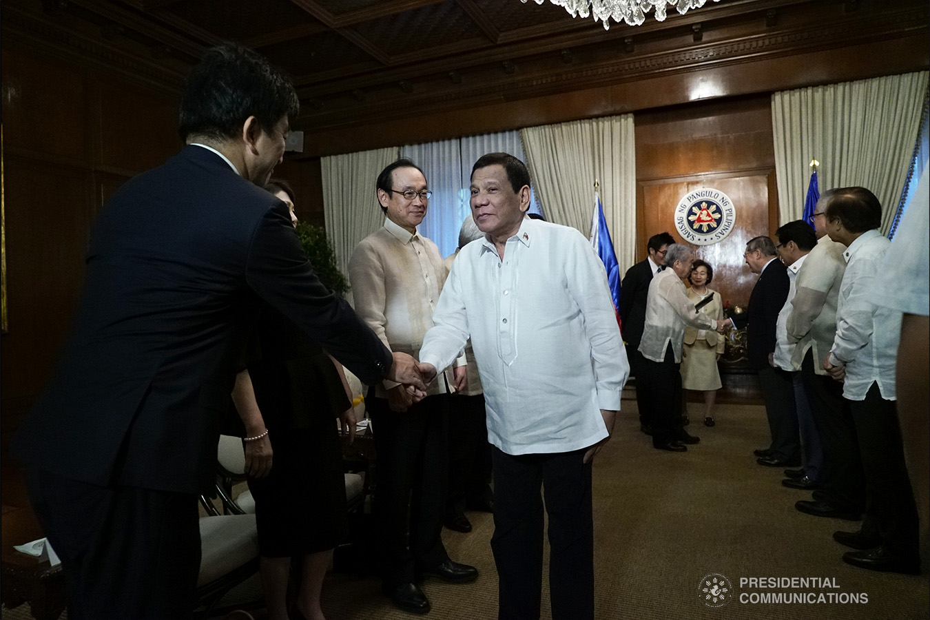 President Rodrigo Roa Duterte shakes the hand of one of the members of Japan's House of Councillors during their courtesy call together with Japan House of Councillors President Chuichi Date, at the Malacañan Palace on January 8, 2018. KING RODRIGUEZ/PRESIDENTIAL PHOTO