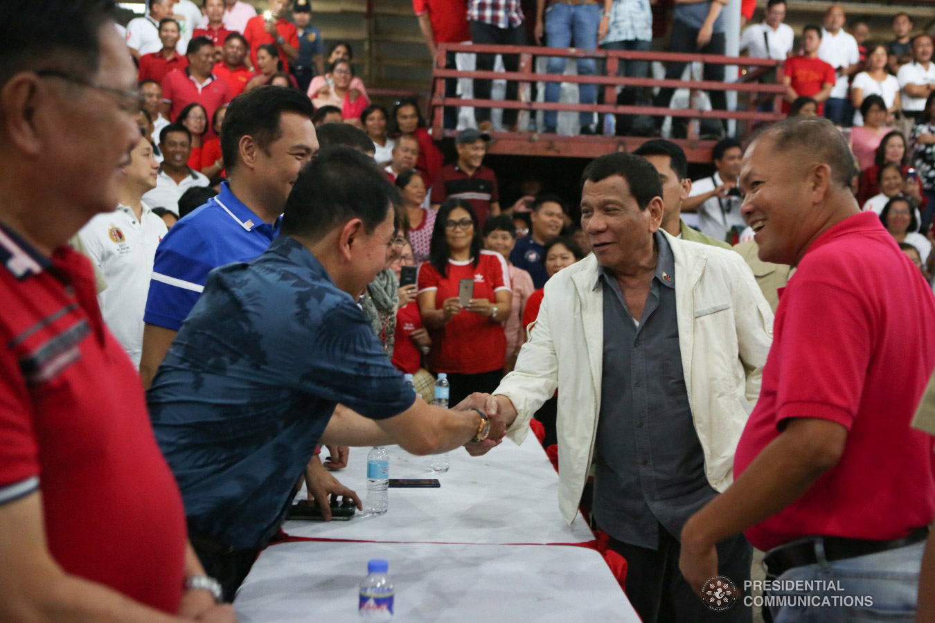 President Rodrigo Roa Duterte shakes the hand of one of the guests during the birthday celebration of Masbate Governor Antonio Kho at the Kalasangan Farm in Cataingan, Masbate on January 9, 2019. ALBERT ALCAIN/PRESIDENTIAL PHOTO