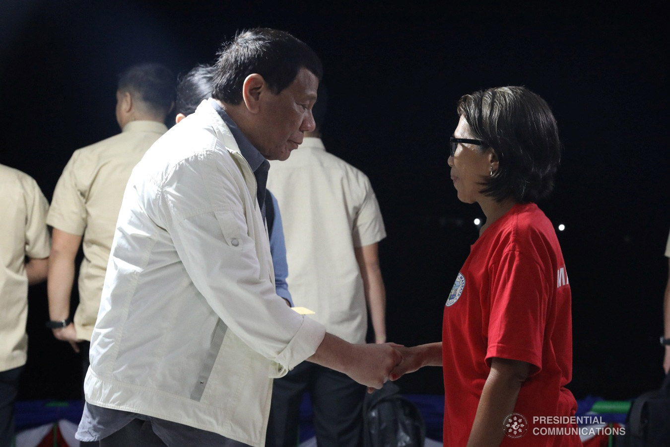 President Rodrigo Roa Duterte shakes the hand of a former New People's Army rebel who recently surrendered to the government, during their formal surrender to the President held at the at the Cataingan National High School in Cataingan, Masbate on January 9, 2019. ACE MORANDANTE/PRESIDENTIAL PHOTO