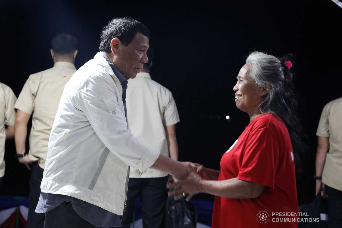 President Rodrigo Roa Duterte shakes the hand of a former New People's Army rebel who recently surrendered to the government, during their formal surrender to the President held at the Cataingan National High School in Cataingan, Masbate on January 9, 2019. ACE MORANDANTE/PRESIDENTIAL PHOTO