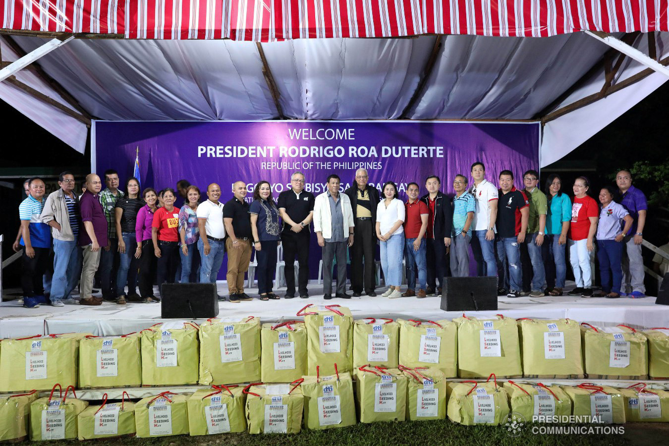 President Rodrigo Roa Duterte poses for posterity together with Trade and Industry Secretary Ramon Lopez, some local officials of Masbate, and other guests during the Negosyo Serbisyo sa Barangay held at the Patio Milagros Minitel and Resort in Dimasalang, Masbate on January 9, 2019. Also in the picture is former Special Assistant to the President Christopher Lawrence "Bong" Go. ACE MORANDANTE/PRESIDENTIAL PHOTO