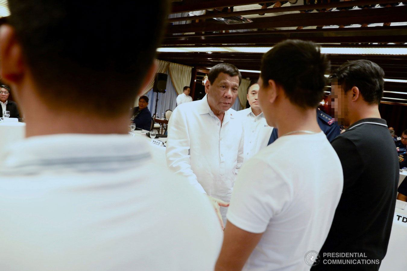 President Rodrigo Roa Duterte shakes the hand of one of the witnesses of the Batocabe Murder Case, at the sidelines of the Joint Armed Forces of the Philippines-Philippine National Police (AFP-PNP) Command Conference at the Malacañan Palace on January 15, 2019. Included in the picture is former Special Assistant to the President Christopher Lawrence "Bong" Go. ACE MORANDANTE/PRESIDENTIAL PHOTO
