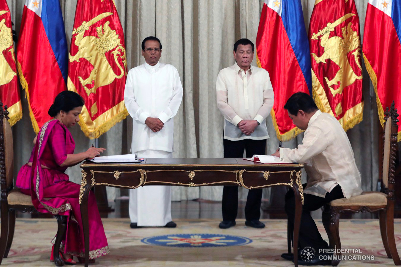 President Rodrigo Roa Duterte and Democratic Socialist Republic of Sri Lanka President Maithripala Sirisena witness the signing of agreements between the Ambassador of Sri Lanka to the Philippines Aruni Ranaraja  and University of the Philippines Los Baños (UPLB) Chancellor Dr. Fernando Sanchez Jr., at the Malacañan Palace on January 16, 2019. The agreement is a Memorandum of Understanding between the University of the Philippines Los Baños and the Sri Lankan Council for Agriculture Research Policy of the Ministry of Agriculture, Rural Economic Affairs, Livestock, Irrigation, Fisheries and Aquatic Resources Development (MAREALIFARD). ACE MORANDANTE/PRESIDENTIAL PHOTO