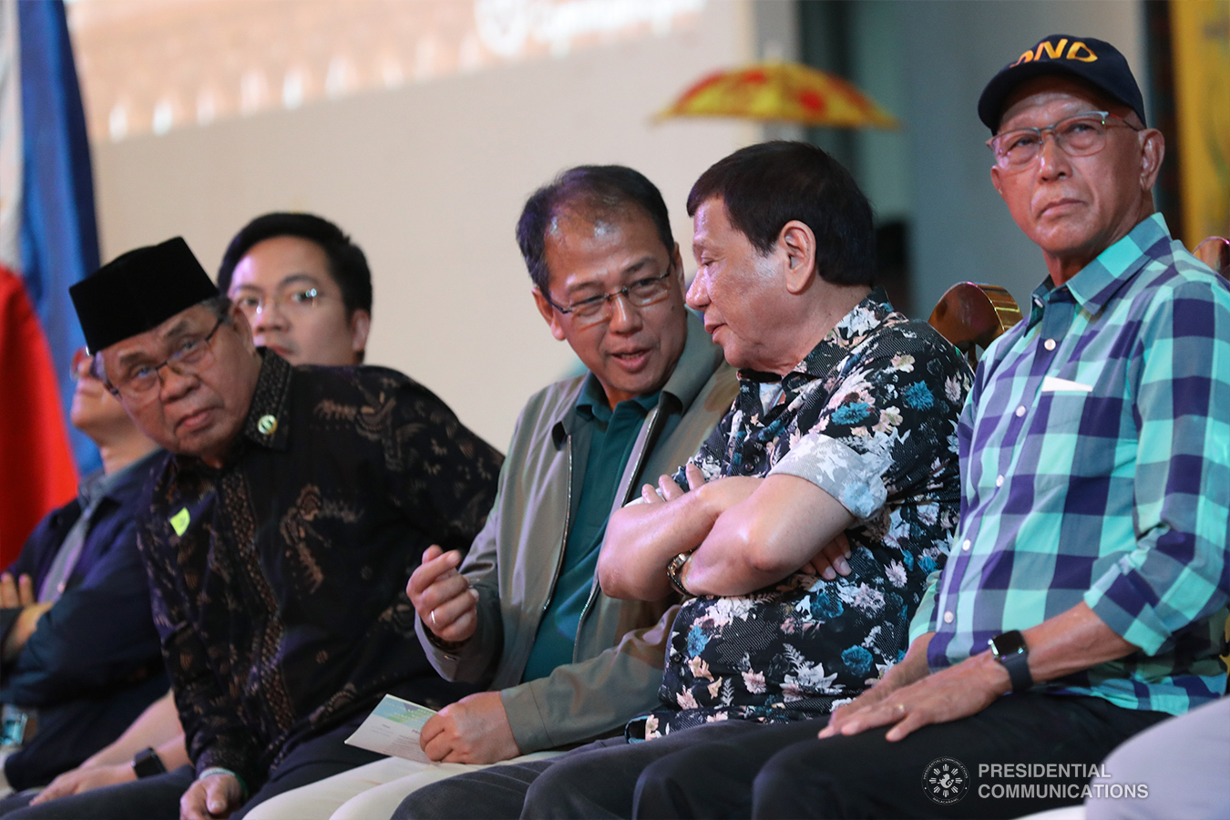President Rodrigo Roa Duterte chats with Presidential Adviser on the Peace Process Carlito Galvez Jr. at the sidelines of the Peace Assembly for the Ratification of Republic Act No. 11054 or the Bangsamoro Organic Law (BOL), held at the Shariff Kabunsuan Cultural Complex in Cotabato City on January 18, 2019. Also in the photo are Moro Islamic Liberation Front Chairman Al-Hajj Murad Ebrahim, Cabinet Secretary Karlo Nograles, and Defense Secretary Delfin Lorenzana. SIMEON CELI JR./PRESIDENTIAL PHOTO