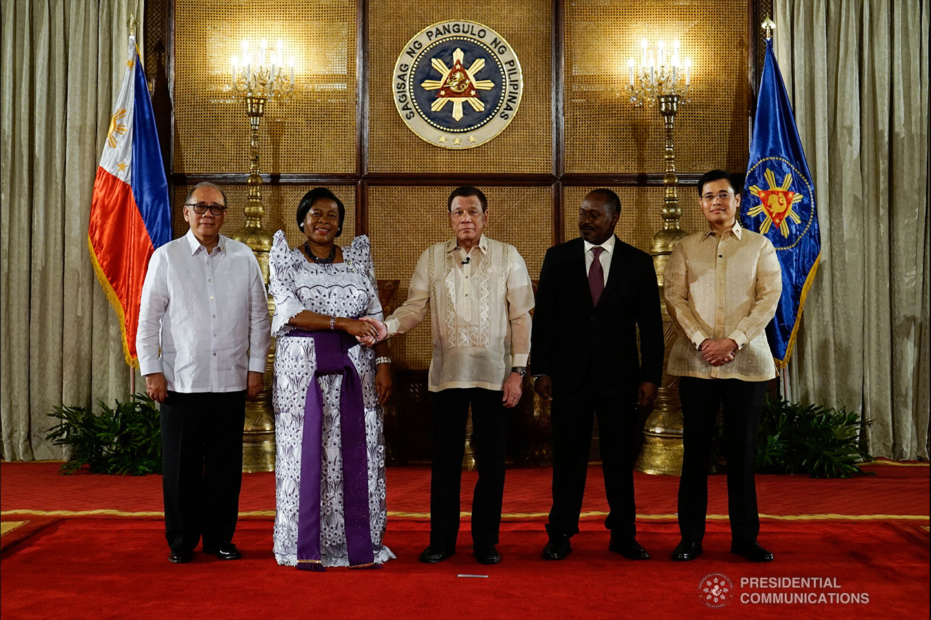 President Rodrigo Roa Duterte poses for posterity with Non-resident Ambassador Designate of Uganda Dorothy Samali Hyuha after the latter presented her credentials to the President during a ceremony at the Malacañan Palace on January 21, 2019. Joining the President are Foreign Affairs Undersecretary Ernesto Abella and Presidential Adviser on Foreign Affairs and Chief of Presidential Protocol Robert Borje. KING RODRIGUEZ/PRESIDENTIAL PHOTO