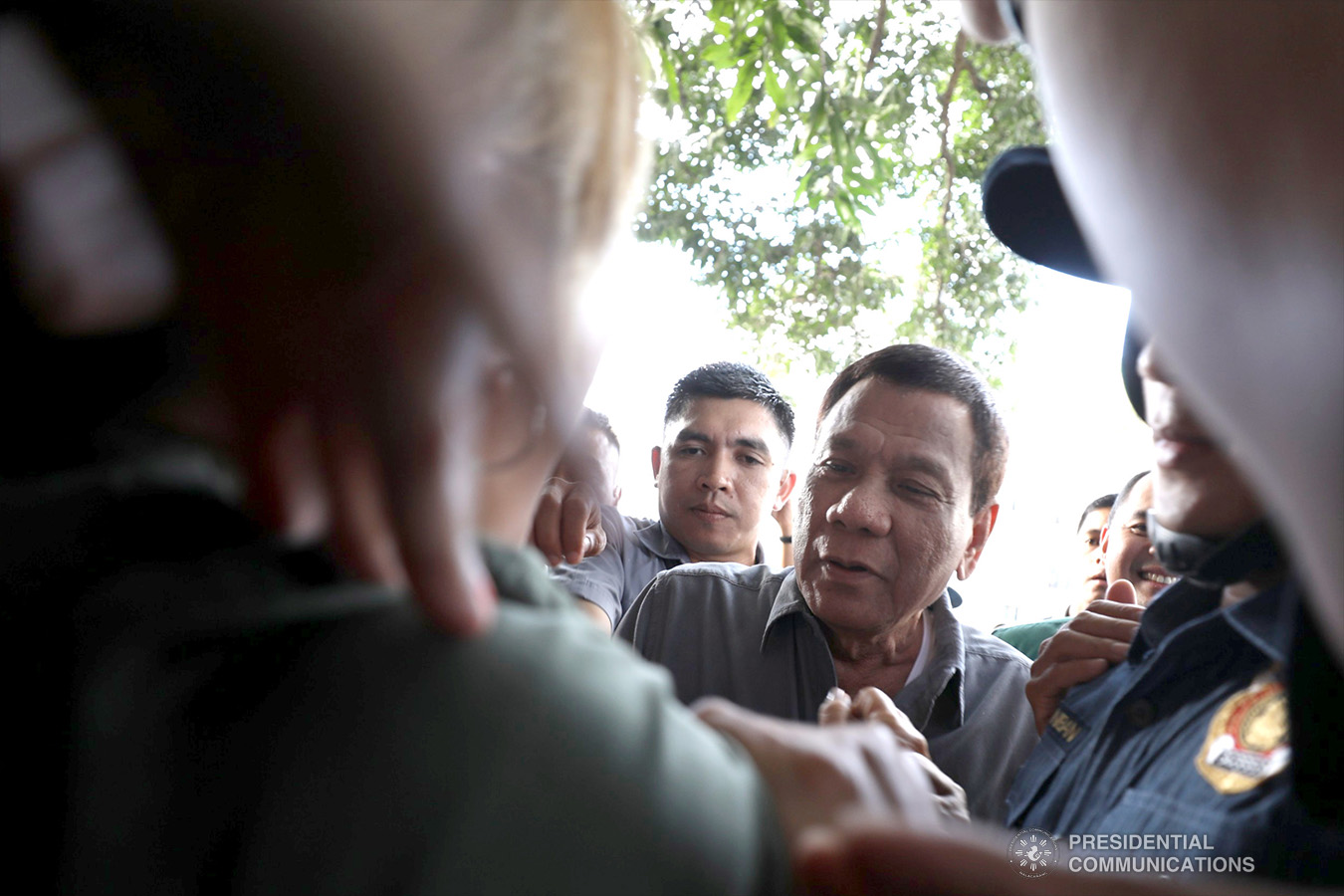 President Rodrigo Roa Duterte approaches his supporters at the sidelines of the annual assembly of the Provincial Union of Leaders Against Illegality (PULI) at the Quezon Convention Center in Lucena City, province of Quezon on January 22, 2019. TOTO LOZANO/PRESIDENTIAL PHOTO