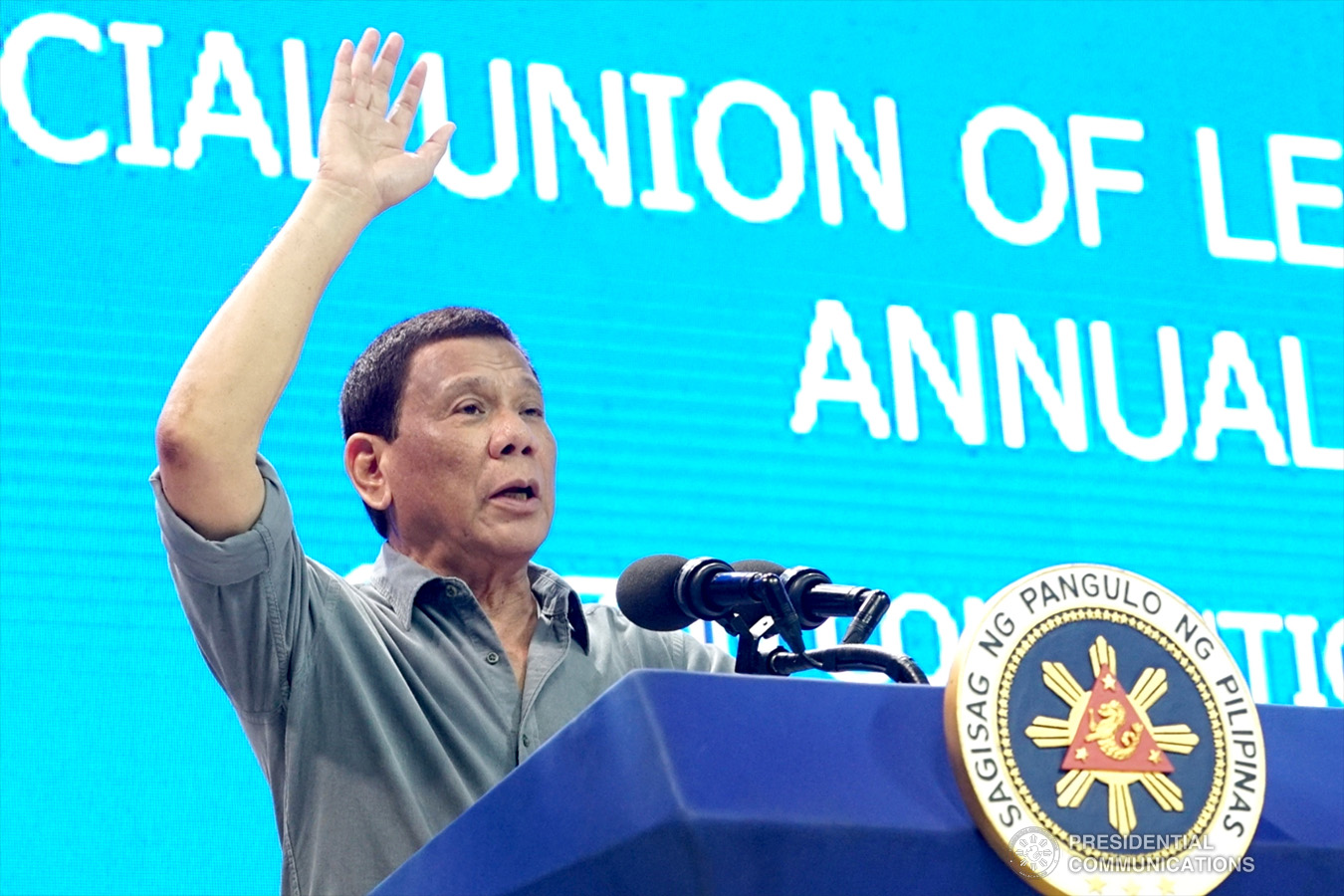 President Rodrigo Roa Duterte acknowledges the cheers of the crowd while delivering his speech during the annual assembly of the Provincial Union of Leaders Against Illegality (PULI) at the Quezon Convention Center in Lucena City, province of Quezon on January 22, 2019. RENE LUMAWAG/PRESIDENTIAL PHOTO