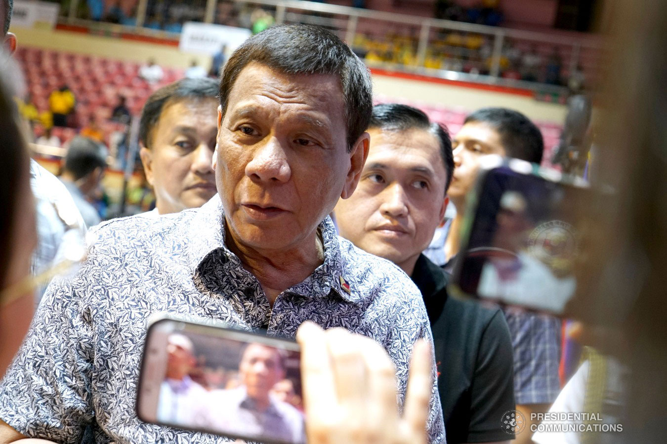 President Rodrigo Roa Duterte answers questions from members of the media at the sidelines of the Tricycle Operators and Drivers’ Association (TODA) Summit at the Cuneta Astrodome in Pasay City on January 23, 2019. Also invited during the event are Former Special Assistant to the President Christopher Lawrence "Bong" Go and Former Presidential Political Adviser Francis Tolentino. KING RODRIGUEZ/PRESIDENTIAL PHOTO