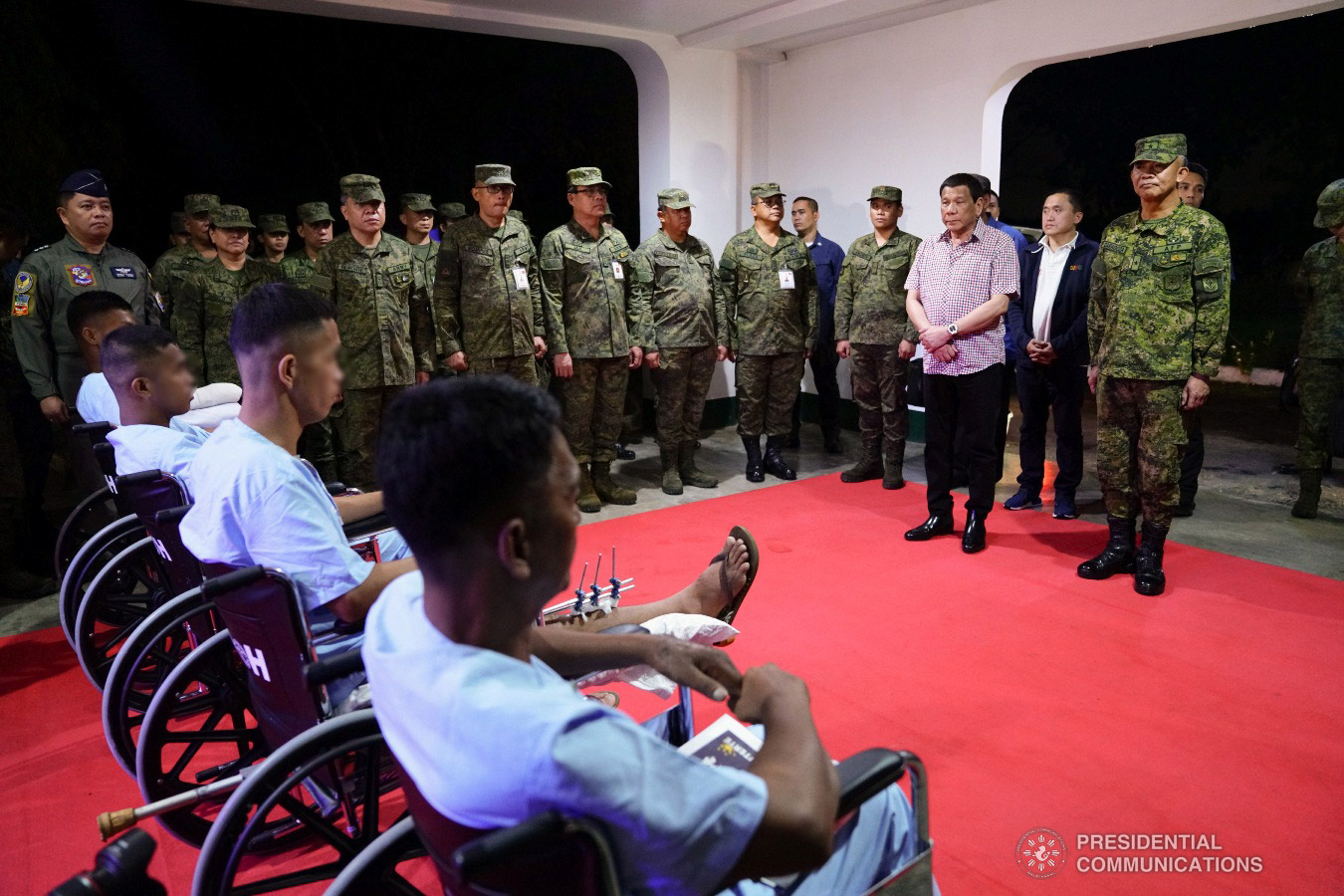 President Rodrigo Roa Duterte talks to the wounded soldiers he visited Camp Evangelista Station Hospital in Cagayan de Oro City Hospital in Cagayan de Oro City on January 25, 2019. JOEY DALUMPINES/PRESIDENTIAL PHOTO