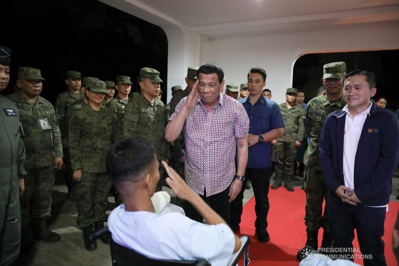 President Rodrigo Roa Duterte salutes one of the wounded soldiers he visited at Camp Evangelista Station Hospital in Cagayan de Oro City on January 25, 2019. KARL NORMAN ALONZO/PRESIDENTIAL PHOTO