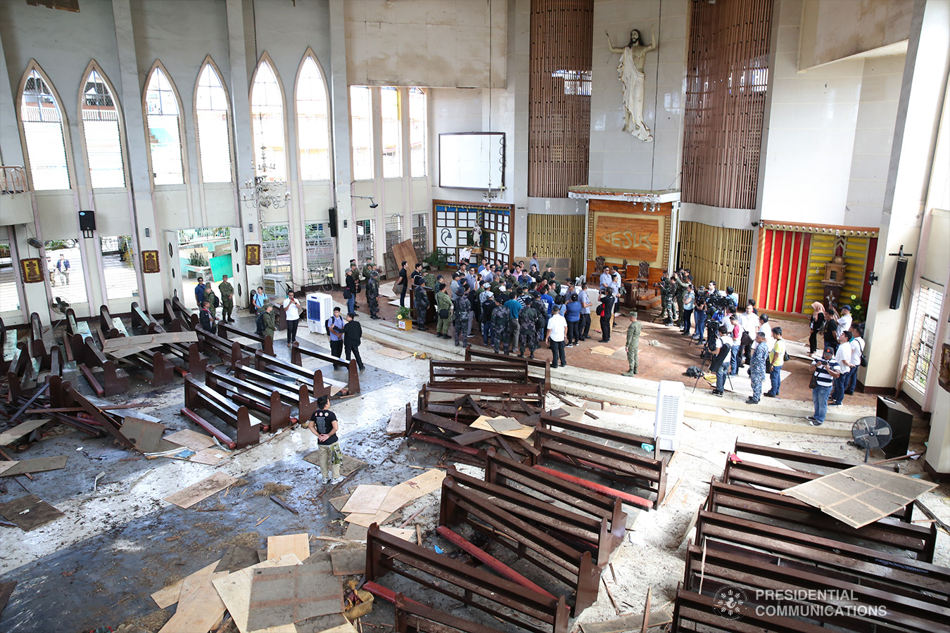President Rodrigo Roa Duterte conducts an inspection inside the Cathedral of Our Lady of Mount Carmel in Jolo, Sulu on January 28, 2019 where two explosions occurred inside and outside the church last January 27. ALBERT ALCAIN/PRESIDENTIAL PHOTO