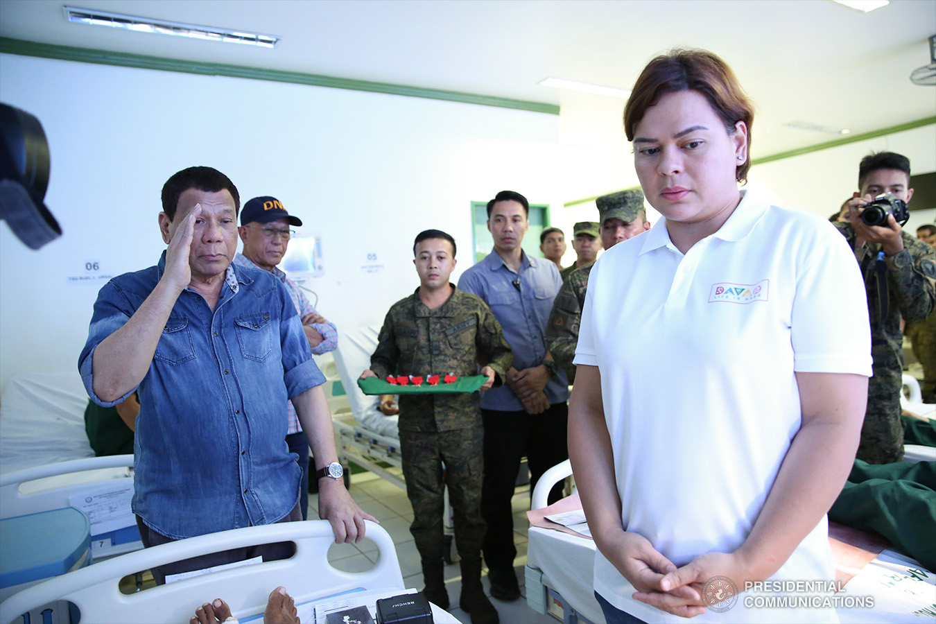 President Rodrigo Roa Duterte salutes one of the wounded soldiers during his visit to Camp Teodulfo Bautista in Jolo, Sulu on January 28, 2019. The President personally checked the condition of the soldiers who were wounded during the twin bombings at the Cathedral of Our Lady of Mount Carmel in Jolo, Sulu last January 27. Accompanying the President are Defense Secretary Delfin Lorenzana and Davao City Mayor Sara Duterte-Carpio. ALBERT ALCAIN/PRESIDENTIAL PHOTO