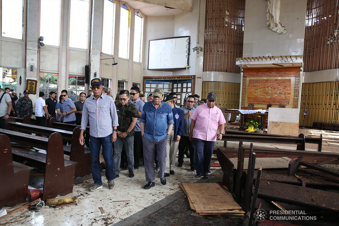 President Rodrigo Roa Duterte conducts an inspection inside the Cathedral of Our Lady of Mount Carmel in Jolo, Sulu on January 28, 2019 where two explosions occurred inside and outside the church last January 27. Accompanying the President are Defense Secretary Delfin Lorenzana, Former Special Assistant to the President Christopher Lawrence "Bong" Go, and National Security Adviser Hermogenes Esperon Jr. KING RODRIGUEZ/PRESIDENTIAL PHOTO