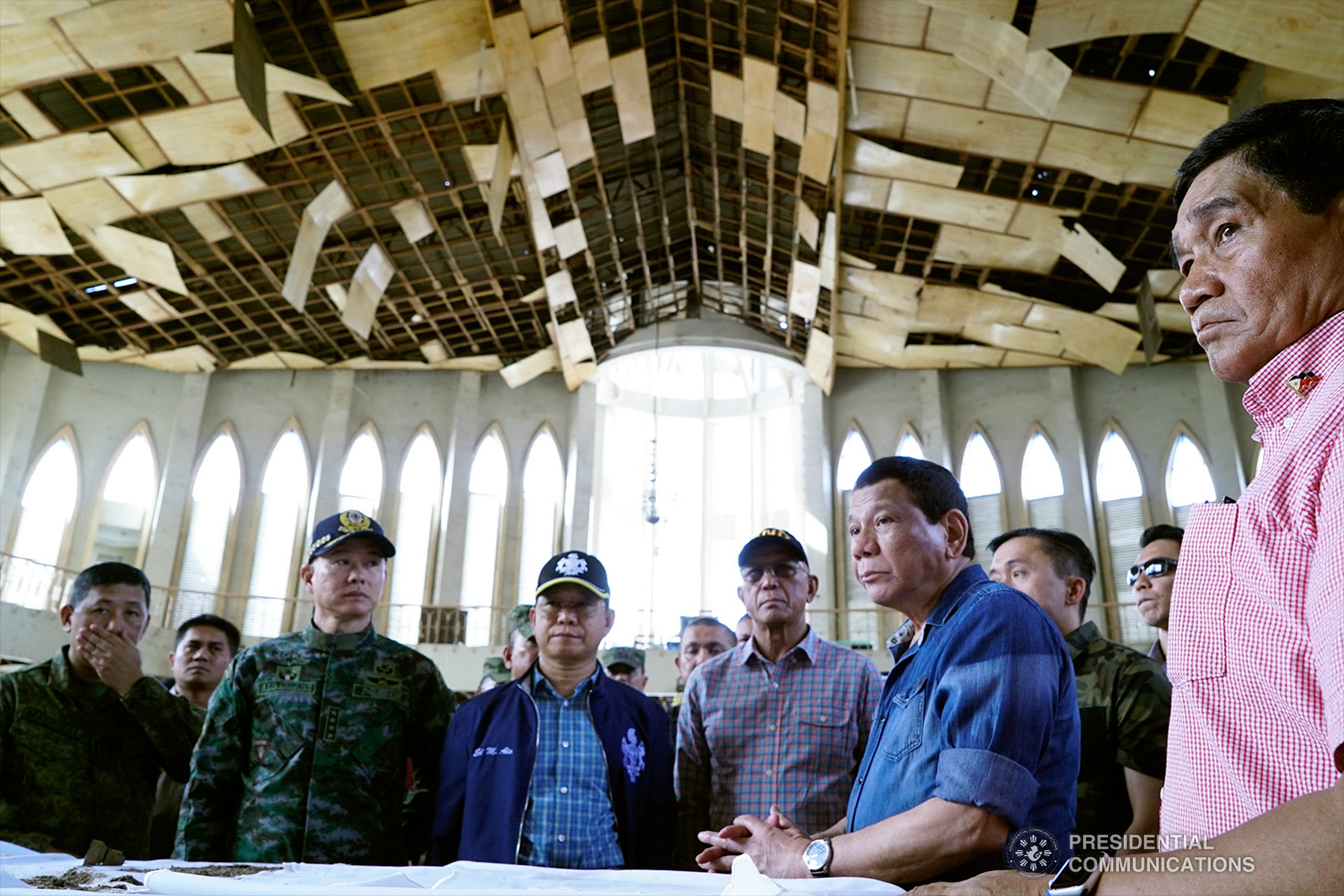 President Rodrigo Roa Duterte conducts an inspection inside the Cathedral of Our Lady of Mount Carmel in Jolo, Sulu on January 28, 2019 where two explosions occurred inside and outside the church last January 27. Accompanying the President are Philippine National Police Director General Oscar Albayalde, Interior and Local Government Secretary Eduardo Año, Defense Secretary Delfin Lorenzana, and National Security Adviser Hermogenes Esperon Jr. KING RODRIGUEZ/PRESIDENTIAL PHOTO
