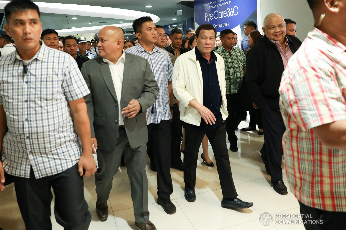 President Rodrigo Roa Duterte is accompanied by Executive Secretary Salvador Medialdea and former PNP chief and BuCor head Ronald Dela Rosa during his arrival at the SM Megamall in Mandaluyong City to watch the premiere of the action film "Bato The Movie: The General Ronald Dela Rosa Story" on January 29, 2019. ACE MORANDANTE/ PRESIDENTIAL PHOTO