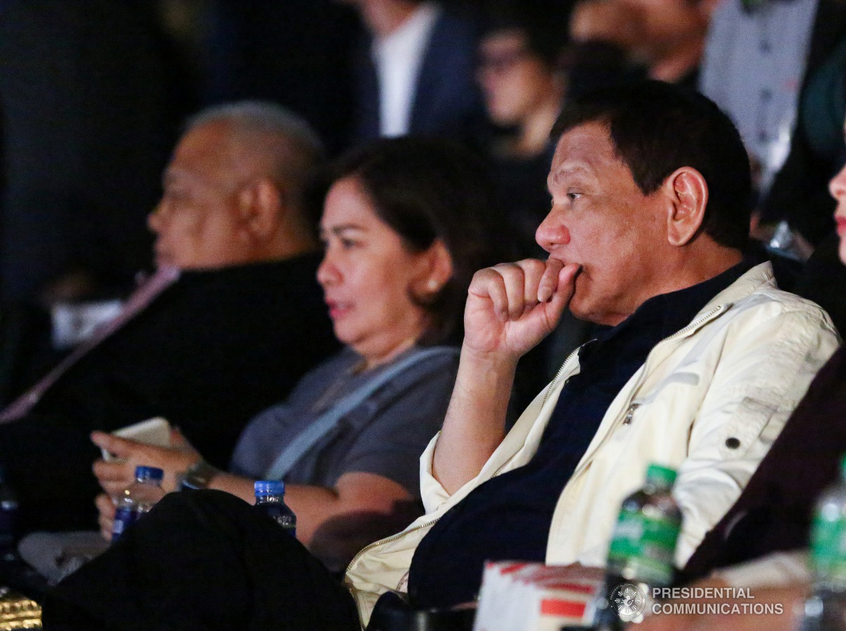 President Rodrigo Roa Duterte intently watches the action film "Bato The Movie: The General Ronald Dela Rosa Story" during the premiere night held at the Cinema 1 of SM Megamall in Mandaluyong City on January 29, 2019. ACE MORANDANTE/ PRESIDENTIAL PHOTO