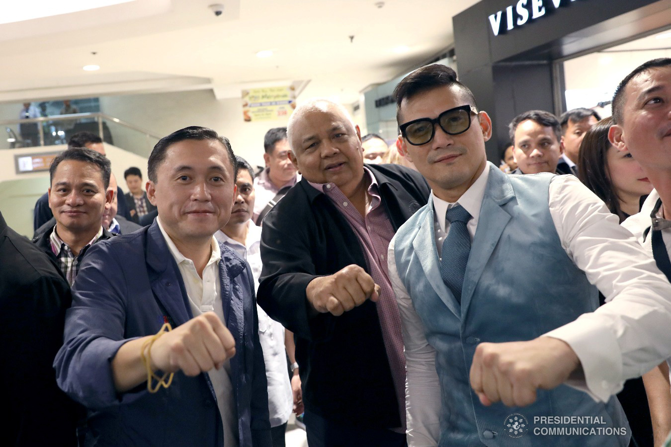 Invited guests, Executive Secretary Salvador Medialdea and Former Special Assistant to the President Christopher Lawrence Go, have their photo taken with actor Robin Padilla, the lead star of an action film "Bato The Movie: The General Ronald Dela Rosa Story" during the premiere night held at the Cinema 1 of SM Megamall in Mandaluyong City on January 29, 2019. ACE MORANDANTE/ PRESIDENTIAL PHOTO