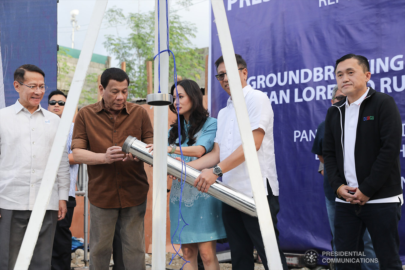 President Rodrigo Roa Duterte prepares to bury the time capsule as he leads the groundbreaking ceremony for the construction of the San Lorenzo Ruiz General Hospital (SLRGH) in Malabon City on January 29, 2019. Joining the President are Health Secretary Francisco Duque III, Malabon City Vice Mayor Jeannie Sandoval, Malabon City Representative Federico Sandoval II, and Former Special Assistant to the President Christopher Lawrence "Bong" Go. REY BANIQUET/PRESIDENTIAL PHOTO