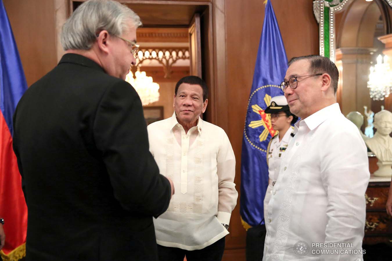 President Rodrigo Roa Duterte and Foreign Affairs Secretary Teodoro Locsin Jr. chat with Russian Ambassador to the Philippines Igor Khovaev who paid a courtesy call on the President at the Malacañan Palace on January 31, 2019. ALBERT ALCAIN/PRESIDENTIAL PHOTO