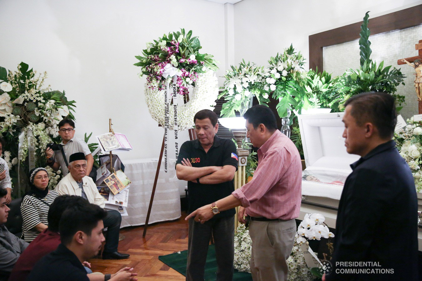 President Rodrigo Roa Duterte condoles with Labor and Employment Undersecretary Jacinto Paras and his family as the President visited the wake of the Undersecretary's wife Olivia Paras at the Heritage Park in Taguig City on February 5, 2019. ALFRED FRIAS/PRESIDENTIAL PHOTO