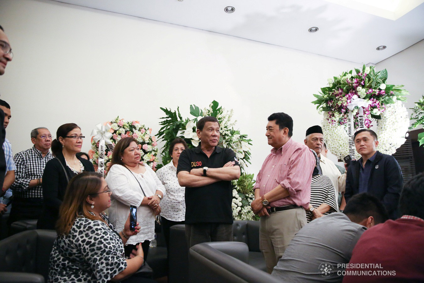 President Rodrigo Roa Duterte condoles with Labor and Employment Undersecretary Jacinto Paras and his family as the President visited the wake of the Undersecretary's wife Olivia Paras at the Heritage Park in Taguig City on February 5, 2019. ALFRED FRIAS/PRESIDENTIAL PHOTO