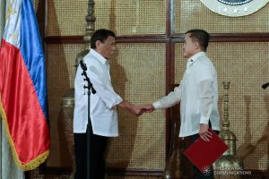 President Rodrigo Roa Duterte congratulates Senator Christopher Lawrence "Bong" Go after administering the oath to the latter during a ceremony at the Malacañan Palace on June 27, 2019. ROBINSON NIÑAL JR./PRESIDENTIAL PHOTO