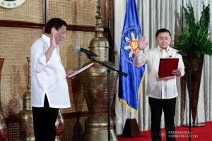 President Rodrigo Roa Duterte administers the oath to Senator Christopher Lawrence "Bong" Go during a ceremony at the Malacañan Palace on June 27, 2019. RICHARD MADELO/PRESIDENTIAL PHOTO
