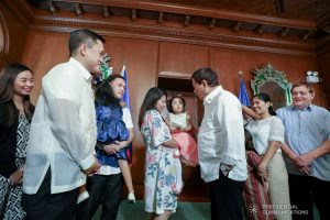 President Rodrigo Roa Duterte shares a light moment with Xia Ngo and her family who met the President at the Malacañan Palace on June 25, 2019. Ngo had a successful liver transplant after her family sought assistance from the President and Senator-elect Christopher Lawrence "Bong" Go. RICHARD MADELO/PRESIDENTIAL PHOTO