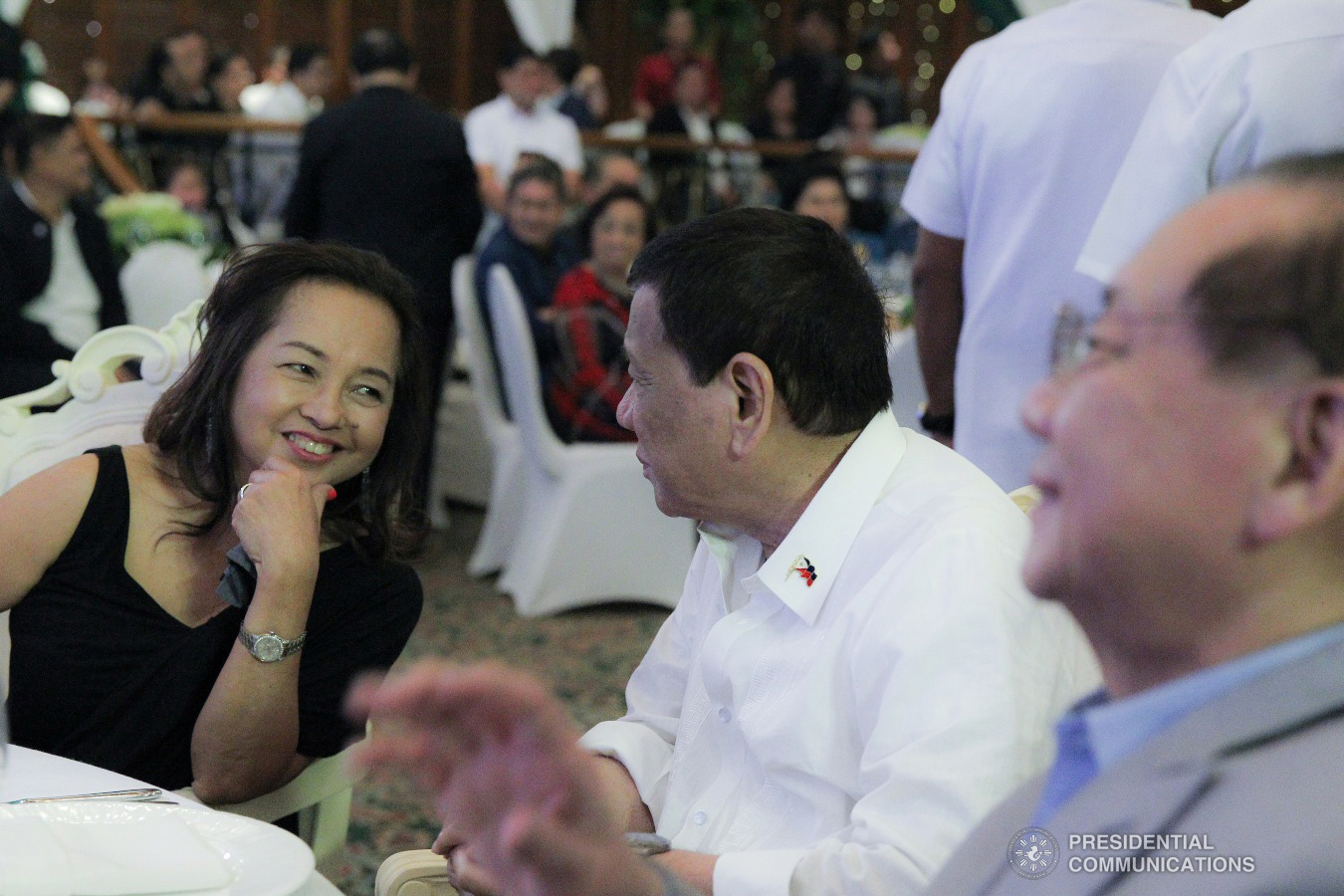 President Rodrigo Roa Duterte shares a light moment with House Speaker Gloria Macapagal-Arroyo during the appreciation dinner for the House Speaker at The Manila Hotel on July 9, 2019. ACE MORANDANTE/PRESIDENTIAL PHOTO