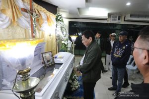 President Rodrigo Roa Duterte pays his last respects to Master Sergeant Ricardo Caacbay as he visits the wake at the Libingan ng mga Bayani Mortuary in Taguig City on June 30, 2019. ALFRED FRIAS/PRESIDENTIAL PHOTO