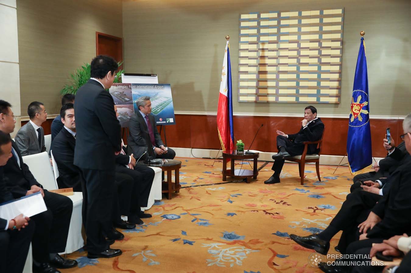 President Rodrigo Roa Duterte discusses matters with officials from Cavite LGU, CAVITEX Holdings, China Communication Construction Company, and China Airport Construction Group who paid a courtesy call on the President at the Grand Hyatt Hotel in Beijing on August 30, 2019. KARL NORMAN ALONZO/ PRESIDENTIAL PHOTO
