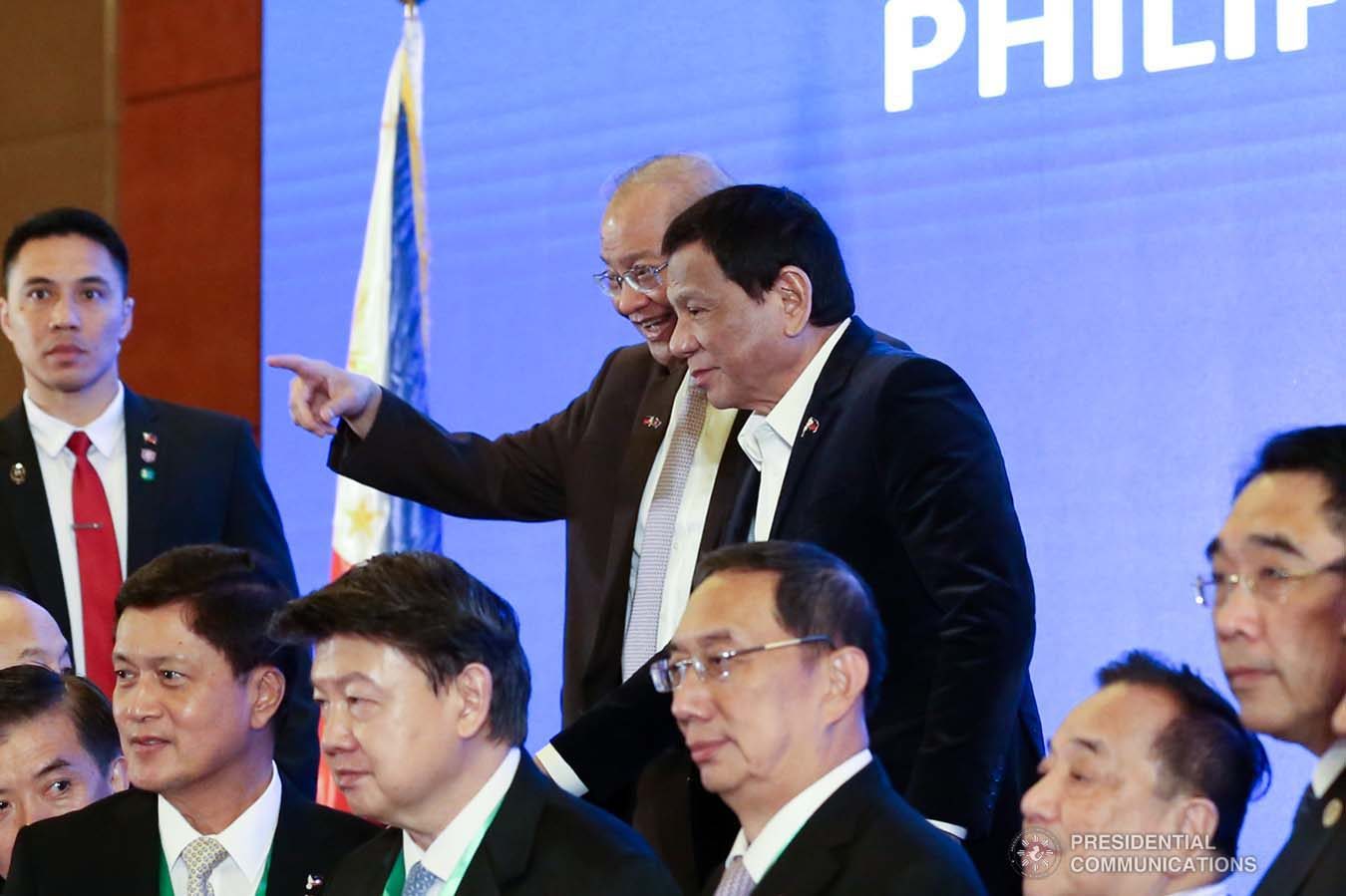 President Rodrigo Roa Duterte interacts with Philippine Ambassador to the People's Republic of China Jose Sta. Romana during the Philippines-China Business Forum at the Grand Hyatt Hotel in Beijing on August 30, 2019. RICHARD MADELO/ PRESIDENTIAL PHOTO