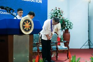 President Rodrigo Roa Duterte takes a bow before the officers and personnel of the Philippine National Police as he takes center stage during the 118th Police Service Anniversary at Camp Brigadier General Rafael T. Crame in Quezon City on August 9, 2019. ALFRED FRIAS/PRESIDENTIAL PHOTO