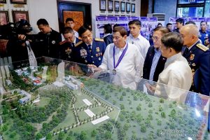 President Rodrigo Roa Duterte inspects the model of the new facilities of the Philippine National Police on the sidelines of the 118th Police Service Anniversary at Camp Brigadier General Rafael T. Crame in Quezon City on August 9, 2019. KING RODRIGUEZ/PRESIDENTIAL PHOTO