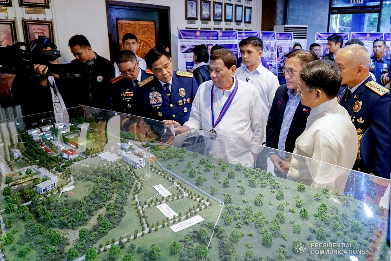 President Rodrigo Roa Duterte inspects the model of the new facilities of the Philippine National Police on the sidelines of the 118th Police Service Anniversary at Camp Brigadier General Rafael T. Crame in Quezon City on August 9, 2019. KING RODRIGUEZ/PRESIDENTIAL PHOTO