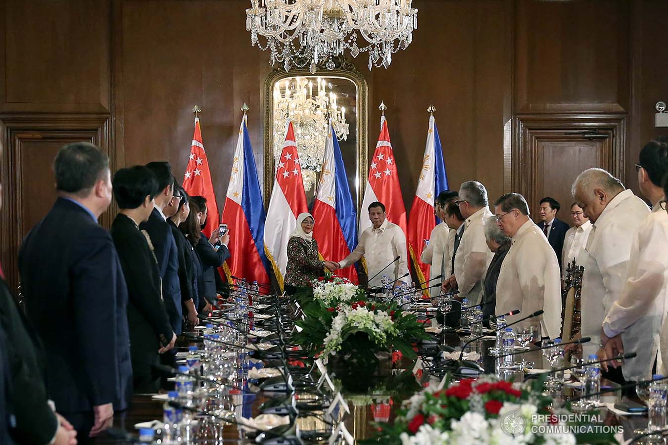 President Rodrigo Roa Duterte and Republic of Singapore President Halimah Yacob pose for posterity prior to the start of their expanded bilateral meeting at the Malacañan Palace during the latter's state visit to the Philippines on September 9, 2019. SIMEON CELI JR./PRESIDENTIAL PHOTO