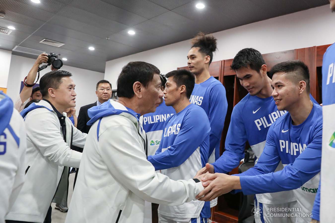 President Rodrigo Roa Duterte wishes the members of the Gilas Pilipinas good luck as he visits their locker room prior to their FIBA Basketball World Cup 2019 game at the Foshan International Sports and Cultural Center in Guangdong on August 31, 2019. TOTO LOZANO/PRESIDENTIAL PHOTO