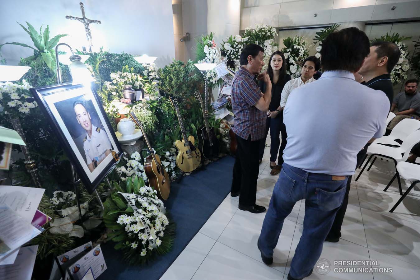 President Rodrigo Roa Duterte commiserates with the family of the late First Officer Lino Cruz III as he visits the wake at the Loyola Memorial Park in Parañaque City on September 5, 2019. Cruz was the co-pilot of the Beechcraft King Air 350 with registry number RP-C2296 that crashed in Calamba City, Laguna last September 1. ACE MORANDANTE/PRESIDENTIAL PHOTO