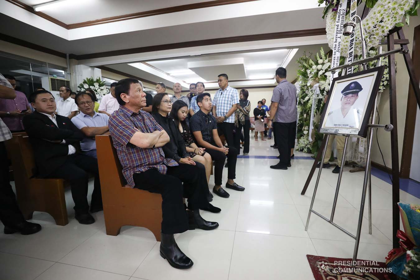 President Rodrigo Roa Duterte pays his last respects to Captain Jesus Hernandez as he visits the wake at the Loyola Memorial Park in Parañaque City on September 5, 2019. Hernandez was the pilot of the Beechcraft King Air 350 with registry number RP-C2296 that crashed in Calamba City, Laguna last September 1. SIMEON CELI JR./PRESIDENTIAL PHOTO