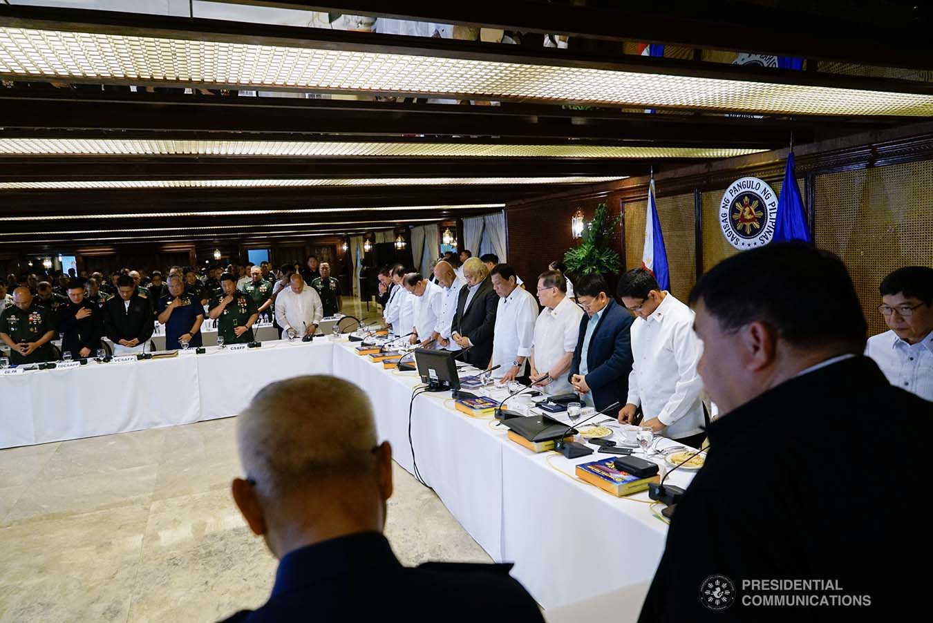 President Rodrigo Roa Duterte bows his head in prayer prior to the start of the Joint Armed Forces of the Philippines-Philippine National Police (AFP-PNP) Command Conference at the Malacañan Palace on September 5, 2019. KING RODRIGUEZ/PRESIDENTIAL PHOTO
