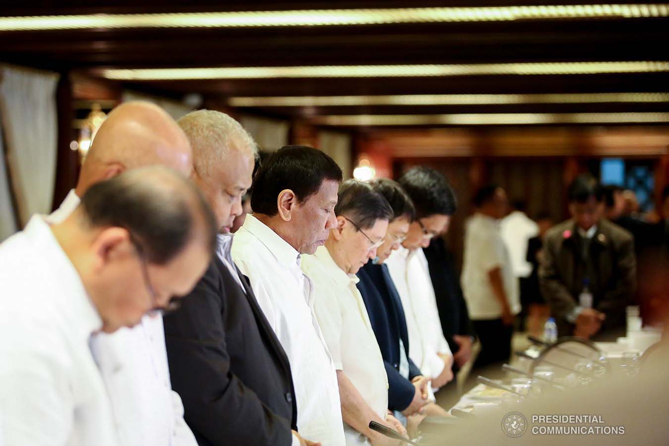 President Rodrigo Roa Duterte bows his head in prayer prior to the start of the Joint Armed Forces of the Philippines-Philippine National Police (AFP-PNP) Command Conference at the Malacañan Palace on September 5, 2019. REY BANIQUET/PRESIDENTIAL PHOTO