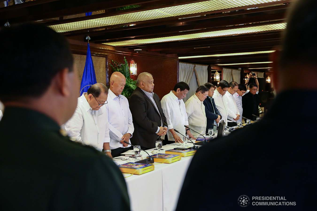 President Rodrigo Roa Duterte bows his head in prayer prior to the start of the Joint Armed Forces of the Philippines-Philippine National Police (AFP-PNP) Command Conference at the Malacañan Palace on September 5, 2019. REY BANIQUET/PRESIDENTIAL PHOTO