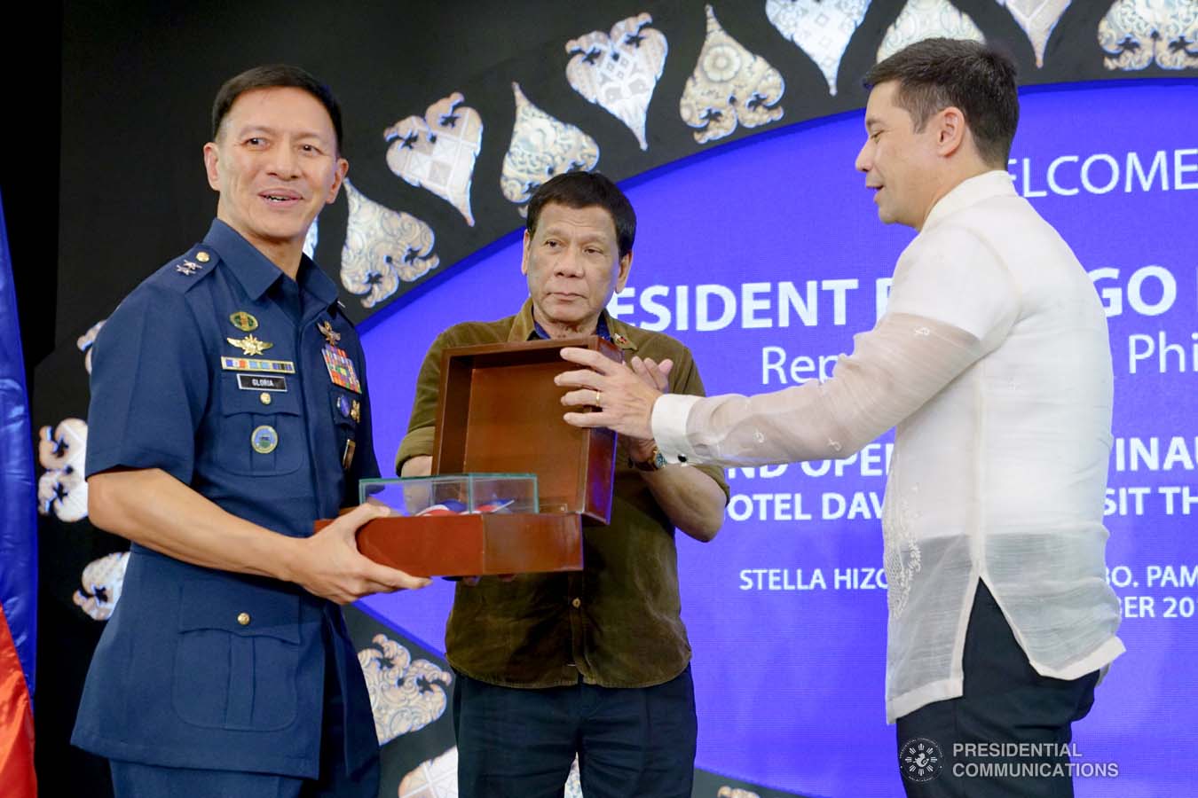 President Rodrigo Roa Duterte witnesses the ceremonial turnover of the token from Torre Lorenzo Development Corporation (TLDC) CEO Tomas Lorenzo to the Armed Forces of the Philippines Educational Benefit System Office (AFP-EBSO) during the inauguration of the Dusit D2 Davao Hotel in Davao City on September 6, 2019. The token symbolizes the commitment of TLDC to donate P1 million per year for a period of ten years to the AFP-EBSO. JOEY DALUMPINES/PRESIDENTIAL PHOTO